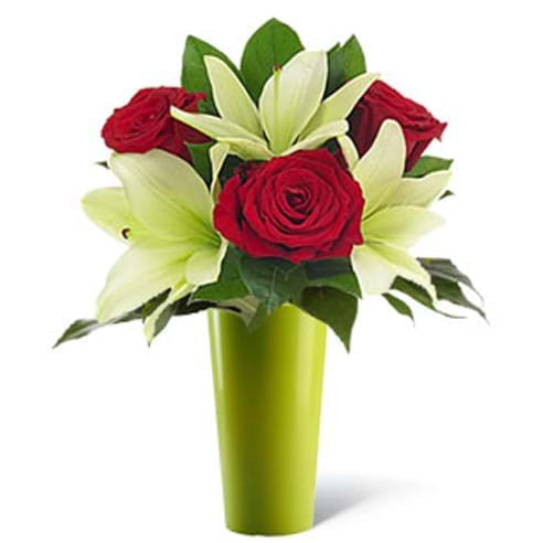 Italia in fiore consegna tre rose rosse e lilium in vaso verde in Italia