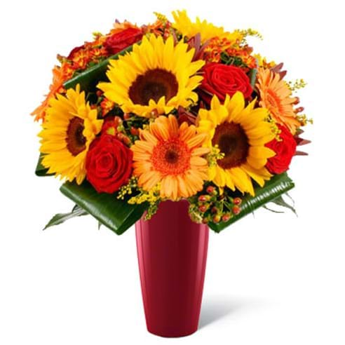 Spedire bouquet arancione con vaso rosso