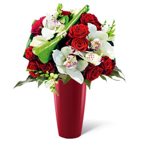 Spedire rose rosse e orchidee in vaso rosso